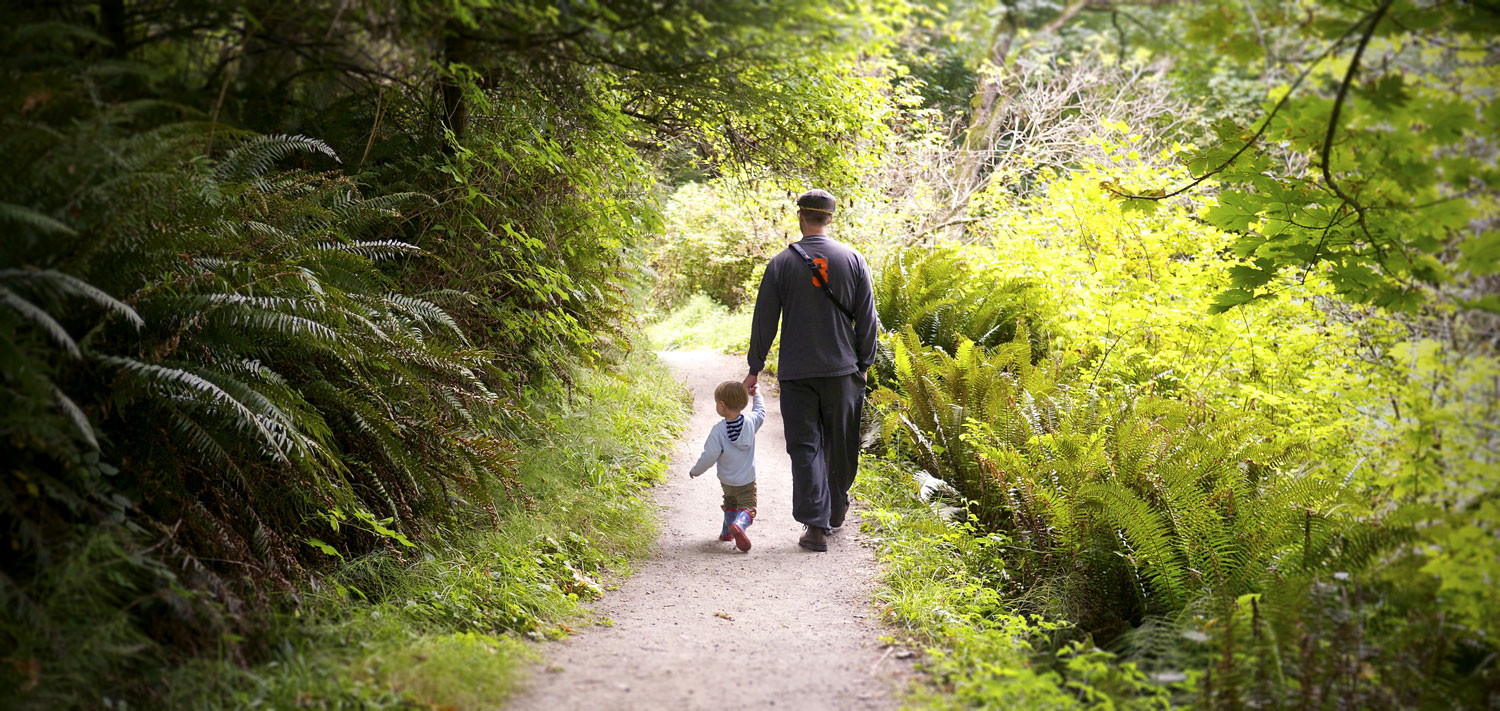 "My son and I walking through the woods"